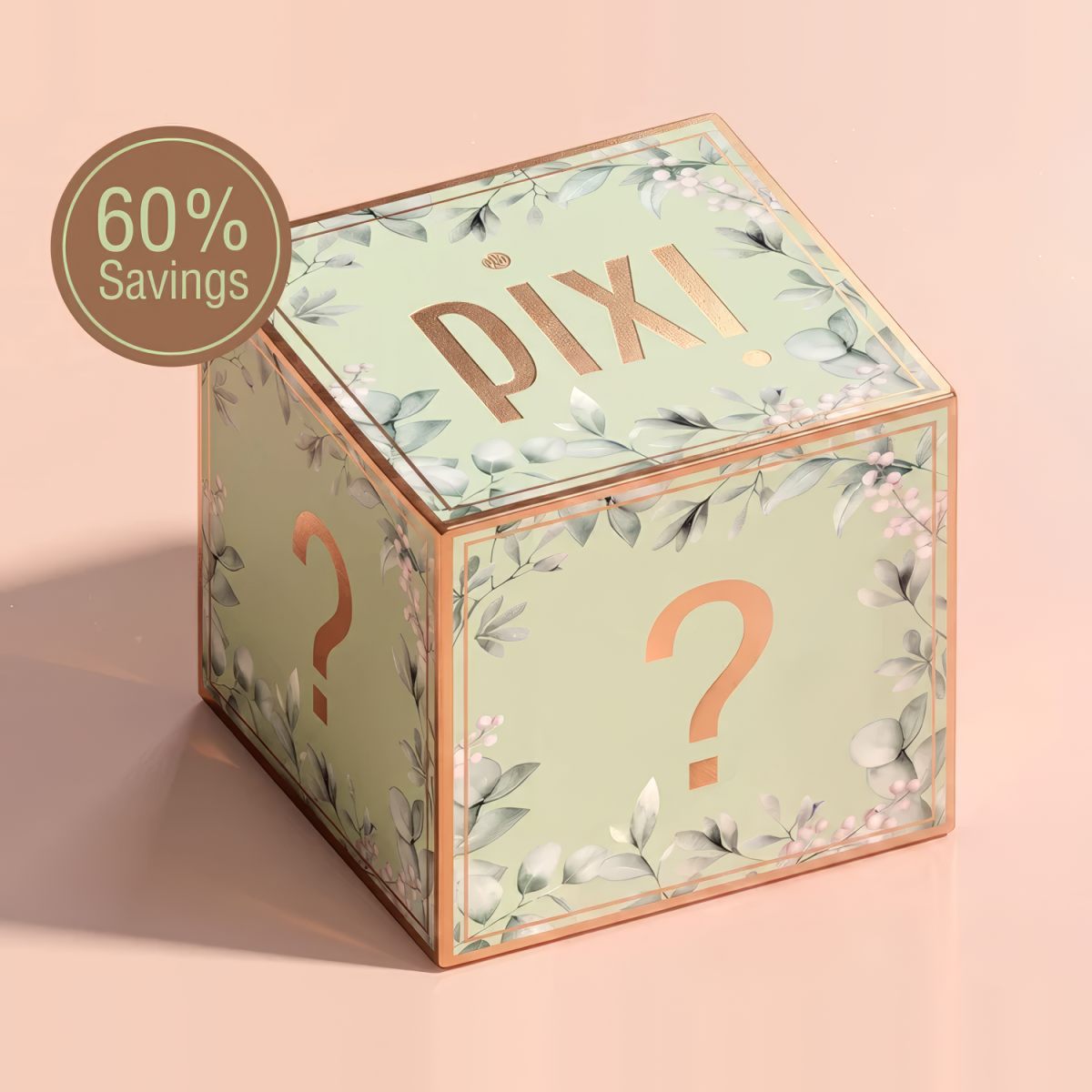 A mint green Pixi mystery box with a floral pattern, featuring a large gold question mark on the front and the Pixi logo on the lid. A brown circular badge in the top left corner reads '60% Savings'.