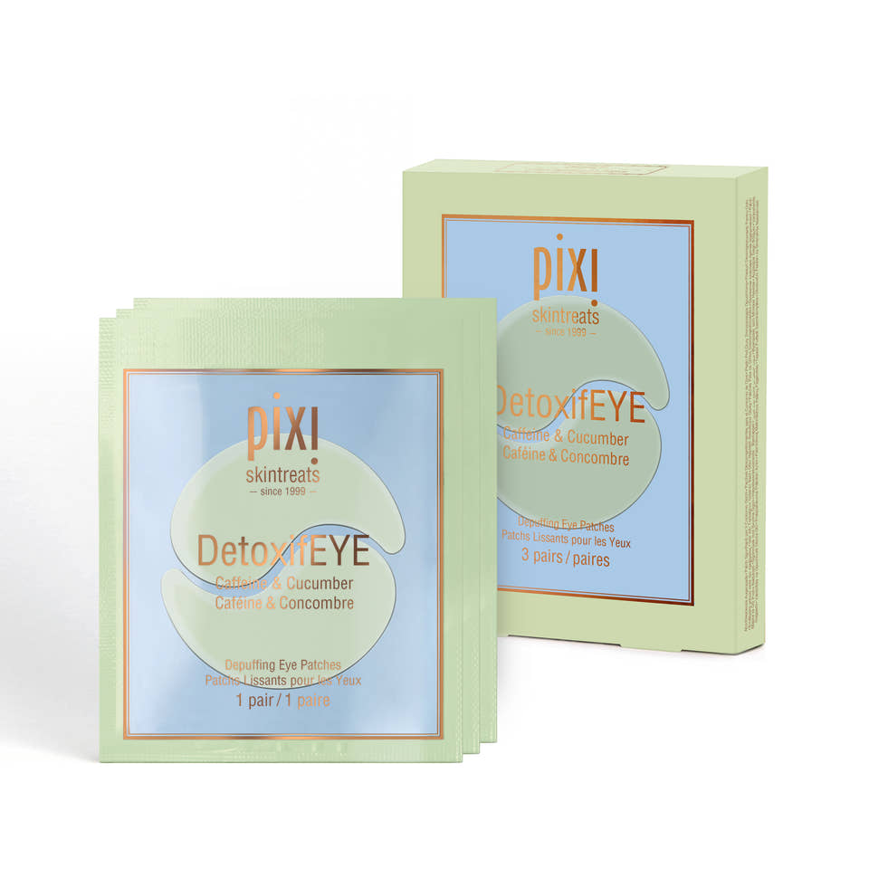 3 DetoxifEYE single use patches grouped together with a box view 1