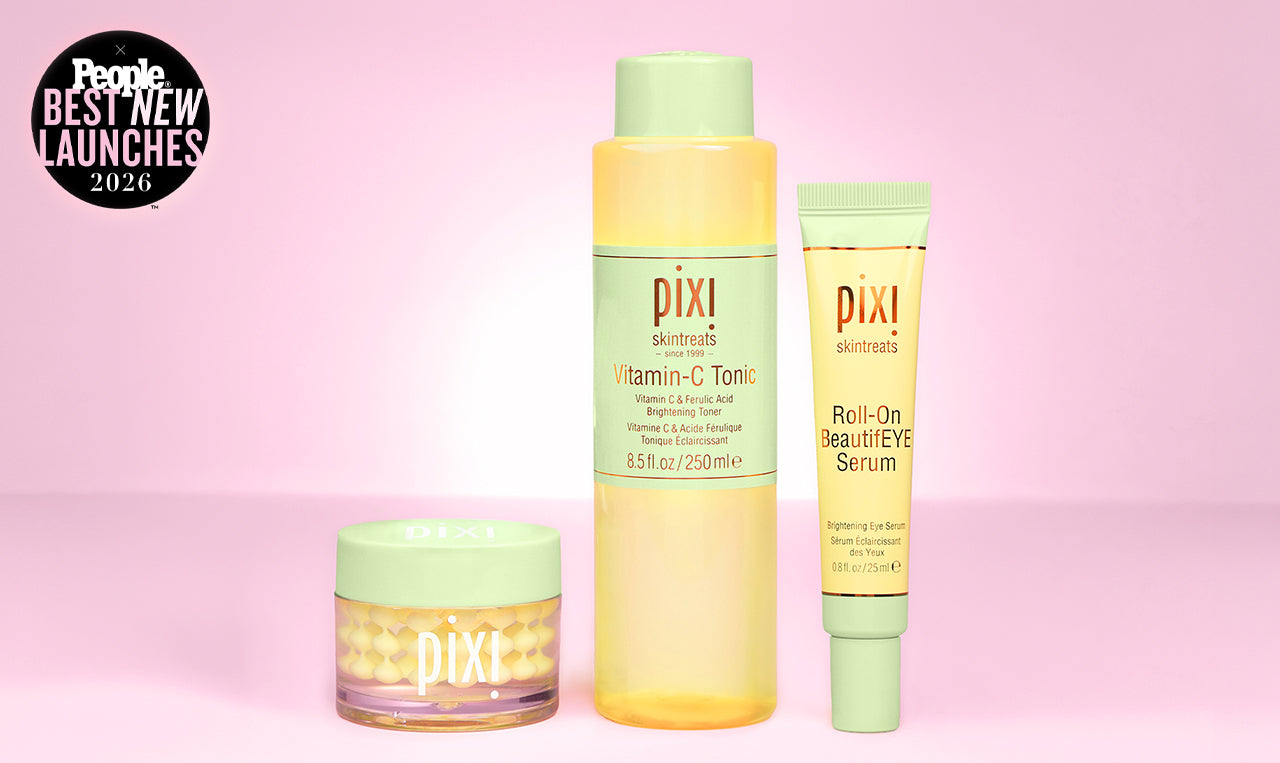 Pixi skincare products on a pink background including Vitamin-C CremeSerum, Tonic and Roll-On BeautifEYE Serum