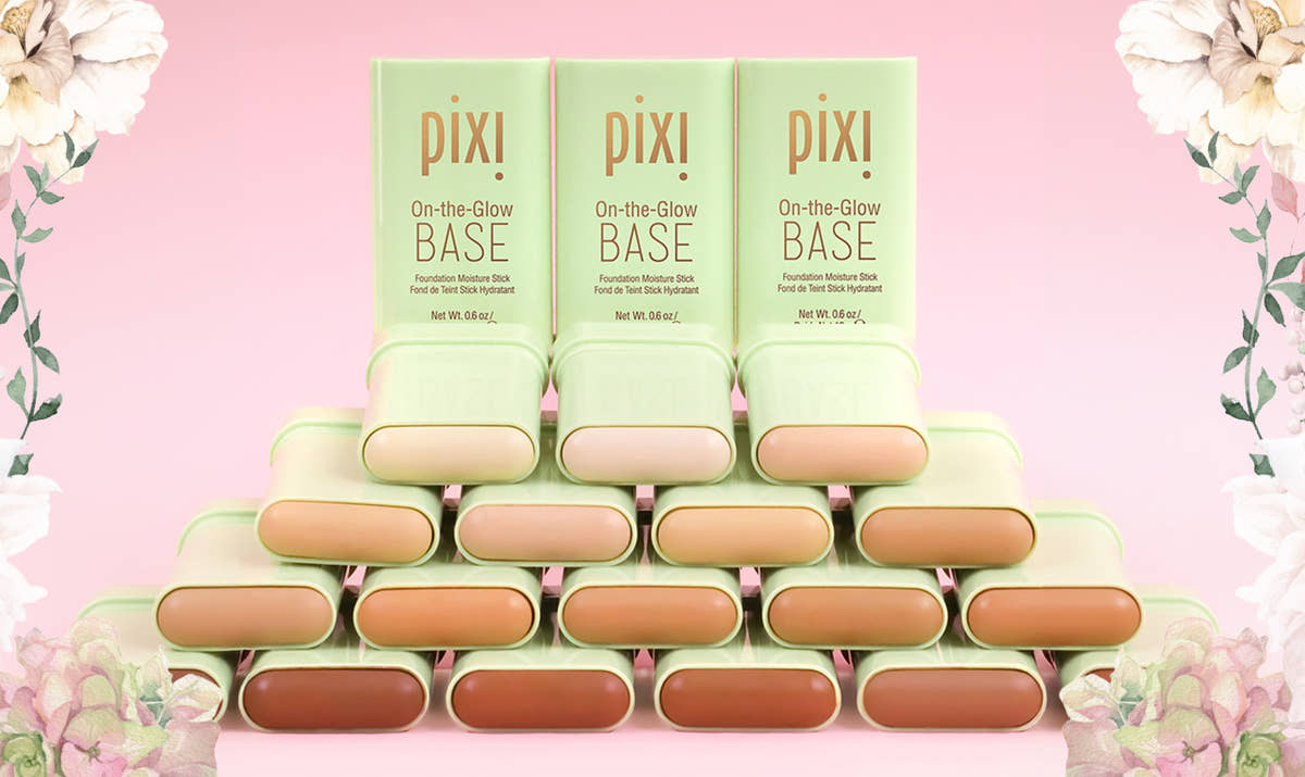 Multiple shades of On-the-Glow Base on a pink background and floral design border
