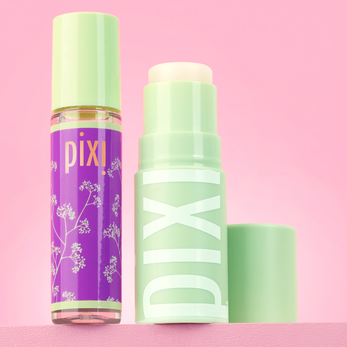 Petra's Overnight Reset featuring Glow-y Lip Oil and +Hydra LipTreat on a pink background -