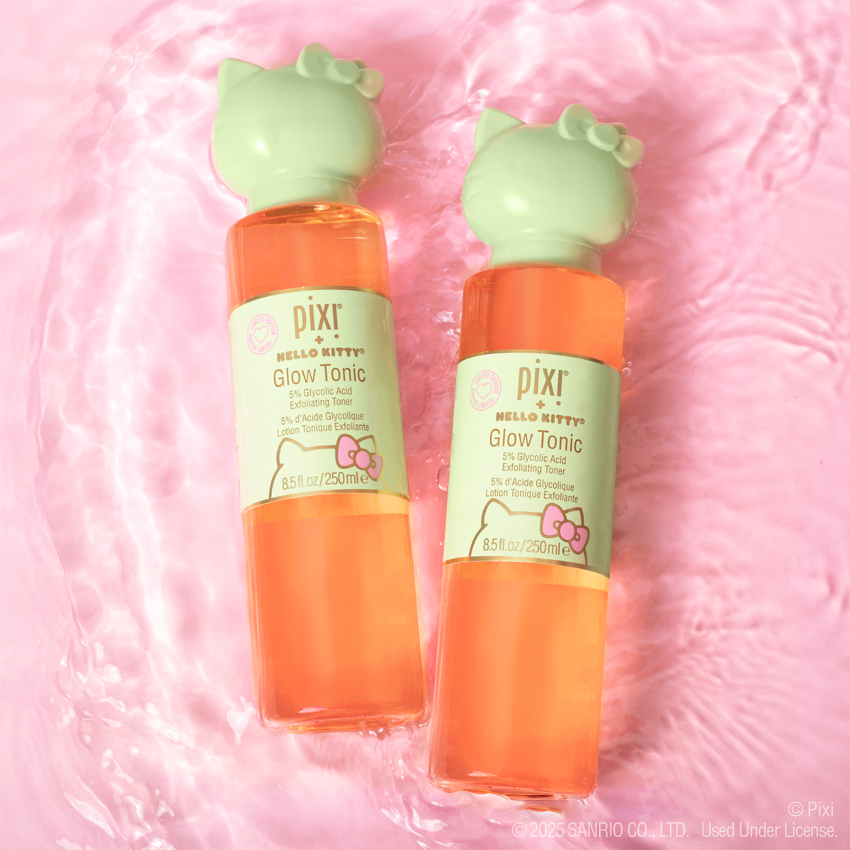 Pixi + Hello Kitty Glow Tonic on a pink background with water