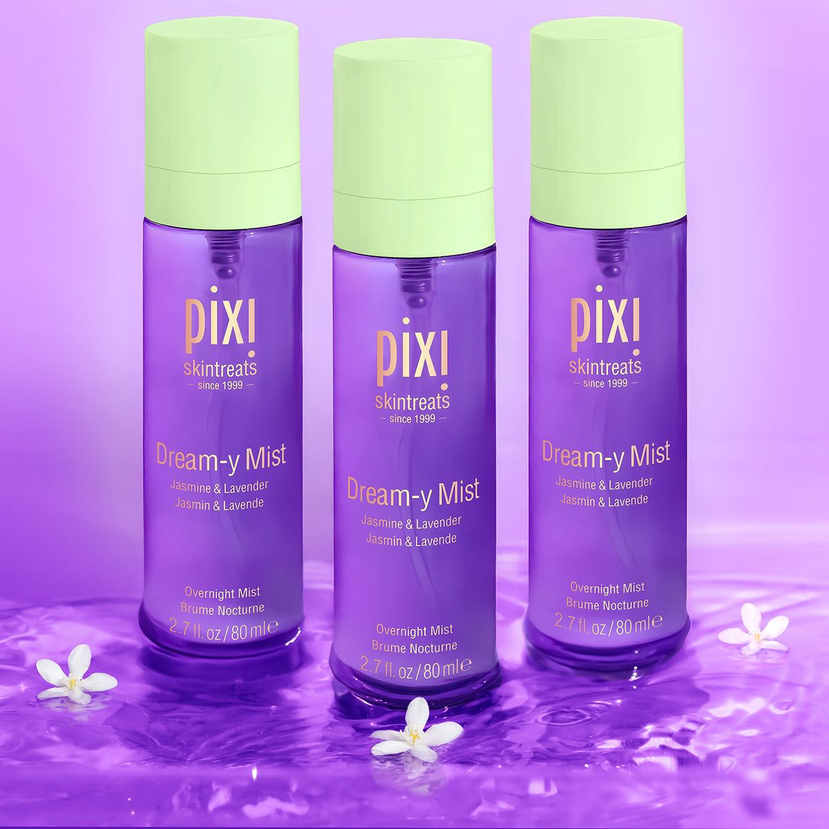Three bottles of Pixi Dream-y Mist on a purple background